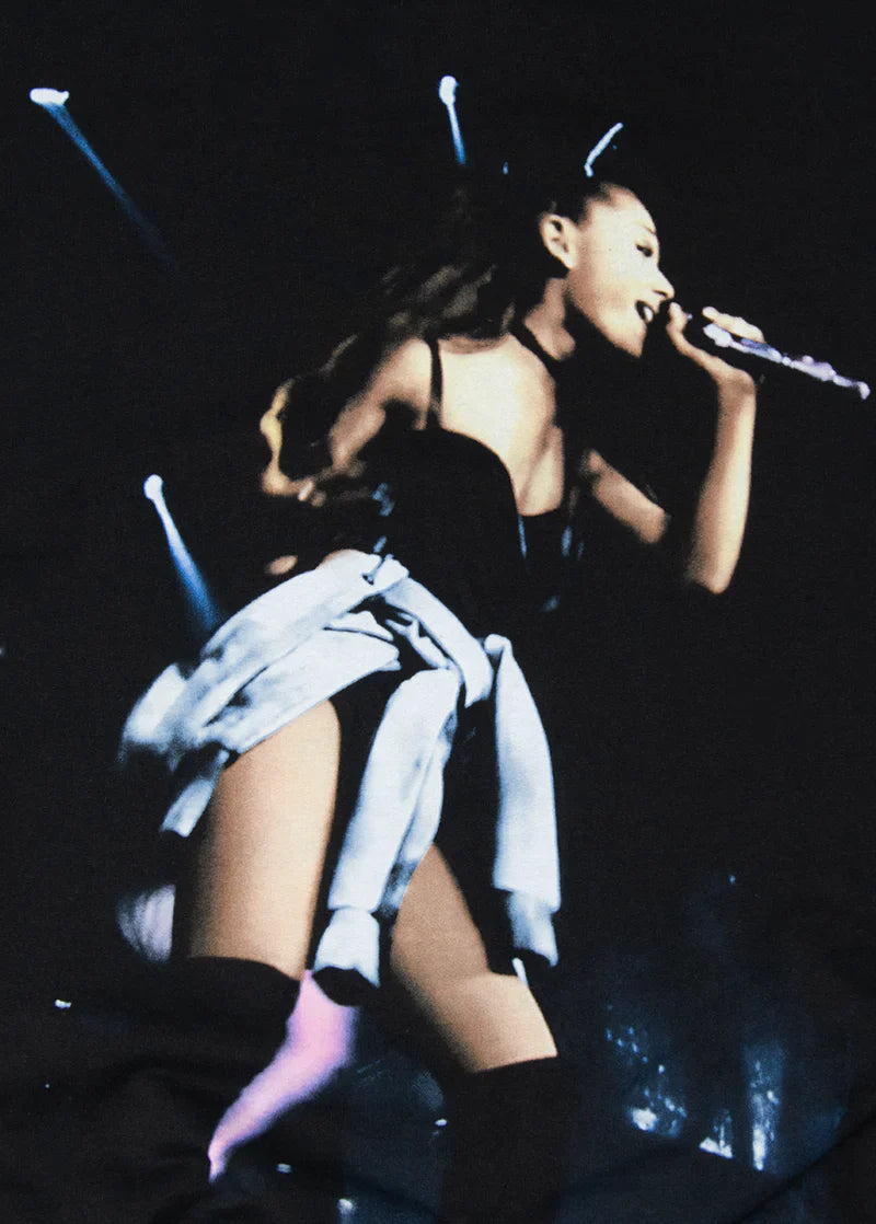 Close-up of Ariana Grande’s concert photo printed on the My Everything crewneck, showing dynamic stage lighting and performance energy in vivid detail.

