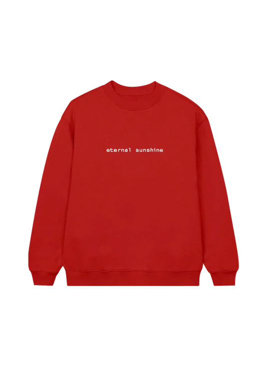 Bright red Ariana Grande crewneck sweatshirt featuring minimalist white text across the chest that reads “eternal sunshine.” Cozy and bold, this statement piece is inspired by Ariana’s Eternal Sunshine album aesthetic.

